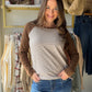 Give your everyday wardrobe a sporty, polished update with the Brown Pinstripe Baseball Sleeve Sweater from Staccato. The crew neckline and color-blocked design create a classic casual look, while the pinstriped finish and baseball-style sleeves add a little extra personality. Pair it with denim, trousers, or your favorite casual bottoms for an easy outfit with standout detail.

Why you’ll love it:

Classic crew neckline
Color-blocked long-sleeve design
Baseball-style sleeve detail
Pinstriped finish
Brown c