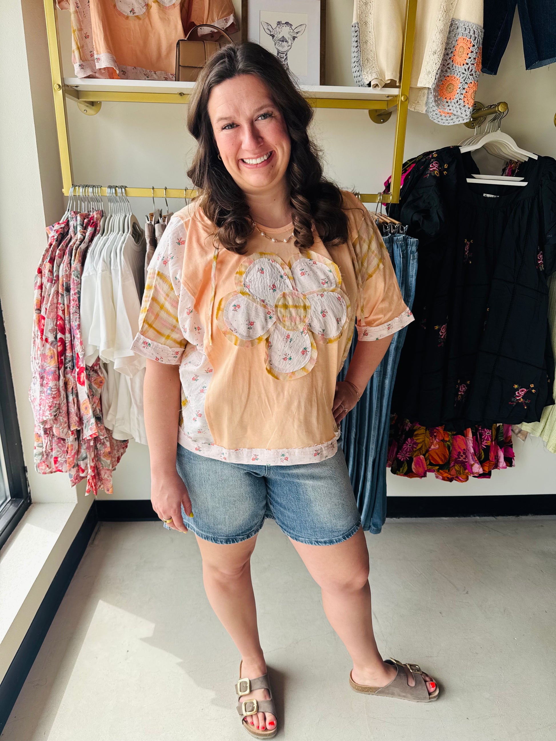 Bibi

This peach short-sleeve hoodie blends boho charm with everyday comfort, featuring a vibrant oversized flower patchwork design. Crafted by Bib Brand, its unique mixed-pattern sleeves and relaxed fit make it the ultimate statement pullover for effortless cottagecore style.

Eye-catching oversized floral patchwork design.
Soft peach fabric for all-day comfort.
Short sleeves perfect for layering.
Stylish mixed-pattern plaid and floral sleeves.
Relaxed pullover fit for easy wear.
Genuine Bib Brand quality 