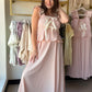 Blush Gingham Smocked Midi Dress

Romantic, feminine, and made for the moments worth dressing up for. This dreamy midi dress features a smocked bodice, delicate lace tape trim, and ruffled bow details that make it feel effortlessly special. The classic gingham print in blush tones keeps it fresh and versatile — perfect for brunch, a garden party, or a summer date night.

Smocked bodice for a flattering, stretchy fit
Lace tape trim with ruffled bow details
Classic gingham print in blush
Midi length
Fully lin