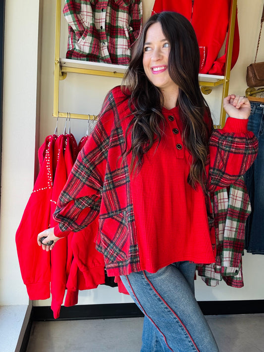 This cozy layered top combines soft plaid fleece with textured waffle knit for effortless style and warmth. Featuring functional button closures and convenient pockets, it's perfect for casual days or relaxed weekends. The mixed fabric design adds visual interest while the relaxed fit ensures all-day comfort. An easy-to-wear piece that transitions seamlessly from season to season.

Bibi