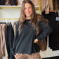 The Black Cozy Light Weight Sweater by Comfy Luxe is the soft, easy layer you’ll reach for on repeat. It’s super soft and cozy without feeling heavy, and the classic black pairs with just about everything already in your closet.

Picture it on a breezy fall morning with your favorite denim and a hot coffee in hand, or layered over a simple tank when there’s a chill in the air. It’s the kind of sweater that makes getting dressed the easiest part of your day.

Details to Love

Super soft and cozy lightweight 