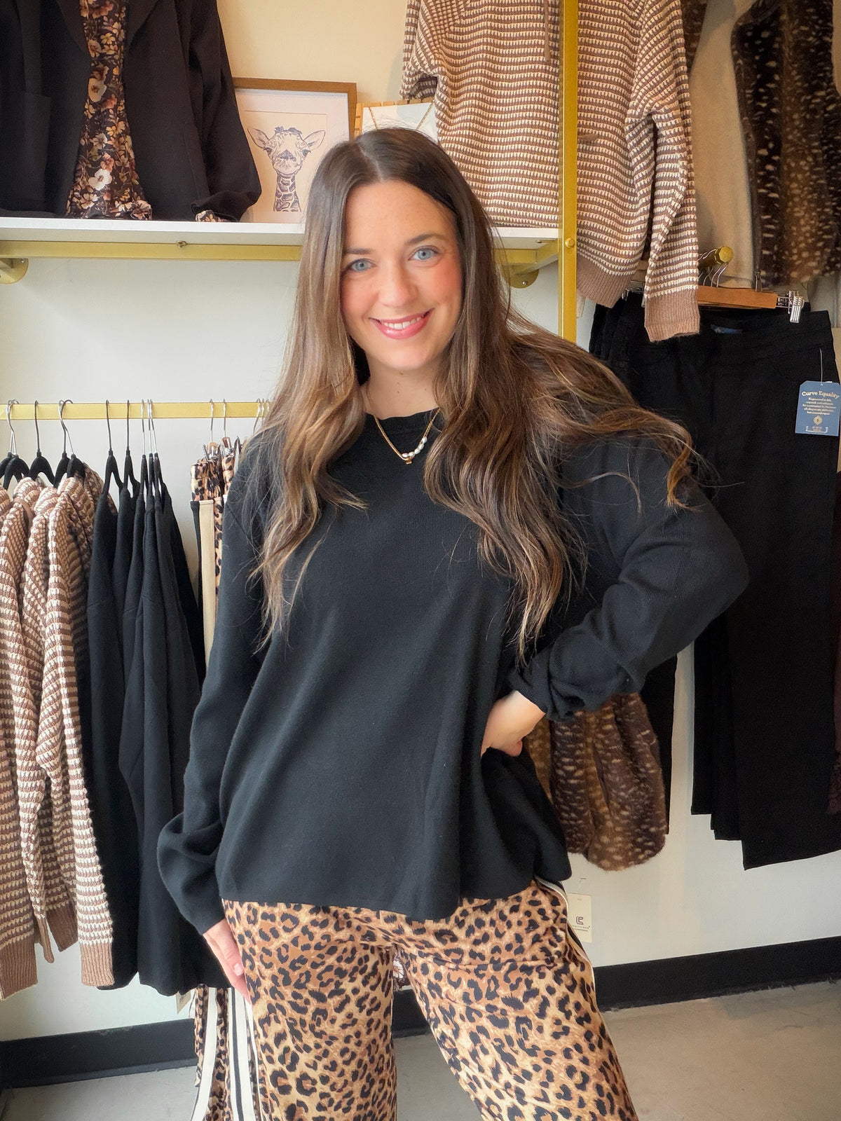 The Black Cozy Light Weight Sweater by Comfy Luxe is the soft, easy layer you’ll reach for on repeat. It’s super soft and cozy without feeling heavy, and the classic black pairs with just about everything already in your closet.

Picture it on a breezy fall morning with your favorite denim and a hot coffee in hand, or layered over a simple tank when there’s a chill in the air. It’s the kind of sweater that makes getting dressed the easiest part of your day.

Details to Love

Super soft and cozy lightweight 