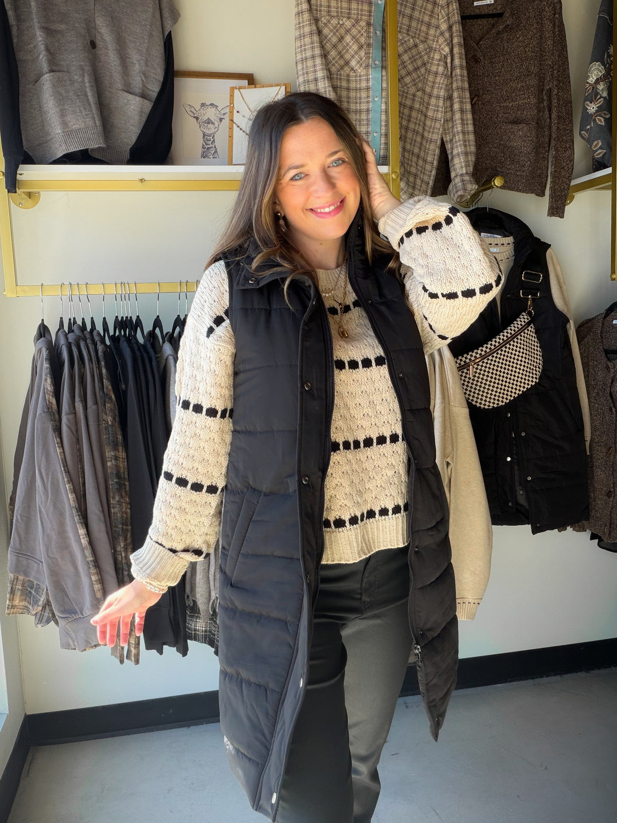 Michelle Mae

Layer up with the Harlow Long Vest—your new go-to for effortless style. This sleek silhouette features a flattering length that works over everything from tees to dresses. Dual pockets keep your essentials close, while the mixed zipper and button closure gives you flexibility to dress it up or down. Versatile, functional, and undeniably chic. A Fall and winter must have!&nbsp;

Fabric: 100% Polyester
Fabric Type: Lightweight Puffer Style
Stretch Factor: Low stretch
Fit: Runs true to size - We 