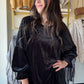 Umgee

Elevate your style with this playful black velvet burnout top, featuring a stunning animal velvet pattern and delicate ladder trim detail. Its soft texture and unique design add a fun twist to any outfit, perfect for those who love mixing comfort with a hint of wild flair.