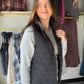 The layer that makes a simple outfit feel finished. The Black Quilted Zip Up Vest by Umgee brings quilted texture to a classic black, sleeveless silhouette. Zip it over a long-sleeve tee for a morning out, or layer it over a sweater when you want to add dimension without hiding the outfit underneath.

Details to love

Quilted design adds texture to everyday looks.
Zip-up front for easy layering.
Versatile black color.
Fabric: 100% polyester.
Fit &amp; styling

Sophie is wearing the Small. Size guide: Small 