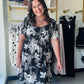 Staccato

Elevate your everyday style with this Staccato floral masterpiece featuring a figure-flattering smocked bodice and breezy flutter sleeves. This monochrome beauty seamlessly blends boho charm with functional hidden pockets for the ultimate summer staple. Perfect for brunch dates or garden parties, it’s the high-comfort, high-impact look your wardrobe demands.

Flattering smocked bodice hugs curves.
Feminine flutter sleeves add movement.
Functional side pockets for essentials.
Chic white floral on b