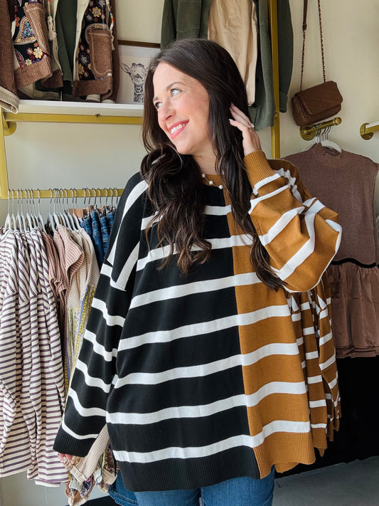 Jess Lea

Take on the fall weather in this adorable two toned striped sweater.&nbsp;

Stay warm and cozy in style with the Parker Striped Sweater! This striped sweater is the perfect way to show off your trendy side with its two toned coloring and stripes.