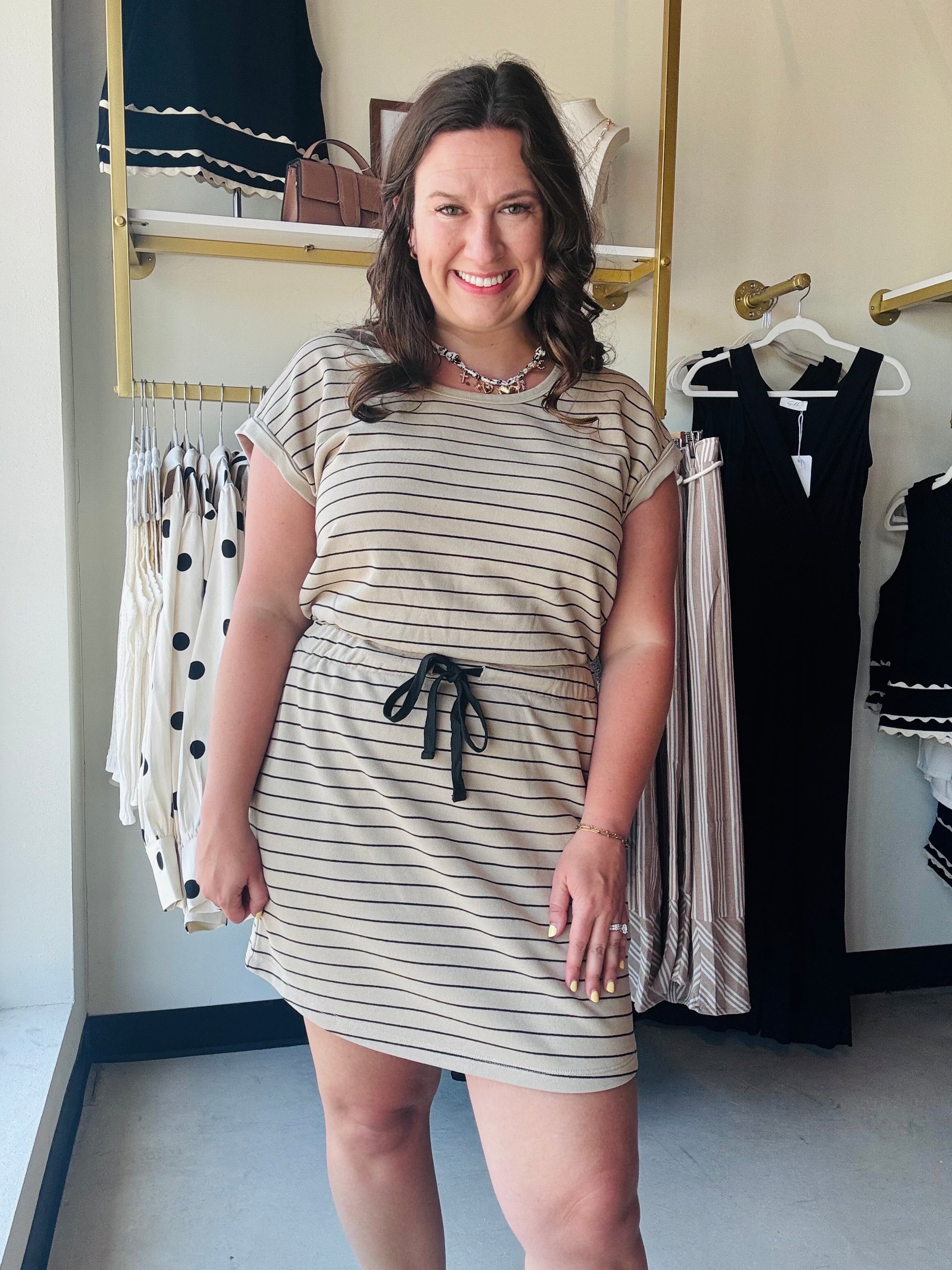 Thread & Supply

Throw on and go - this staple cotton tee dress is featured with an adjustable drawstring waist, scoop neckline and of course, pockets.

Scoop neckline
Adjustable drawstrings on waist
Cap sleeves
Measurements for a size small:

Length: 35.5"
Chest: 19"
Waist: 14.5"
Sweep: 21.5"
Fabric Content/Care:&nbsp;

88% Cotton
12% Polyester
Machine Wash Cold