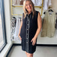 Black collared sleeveless button up dress with white piping