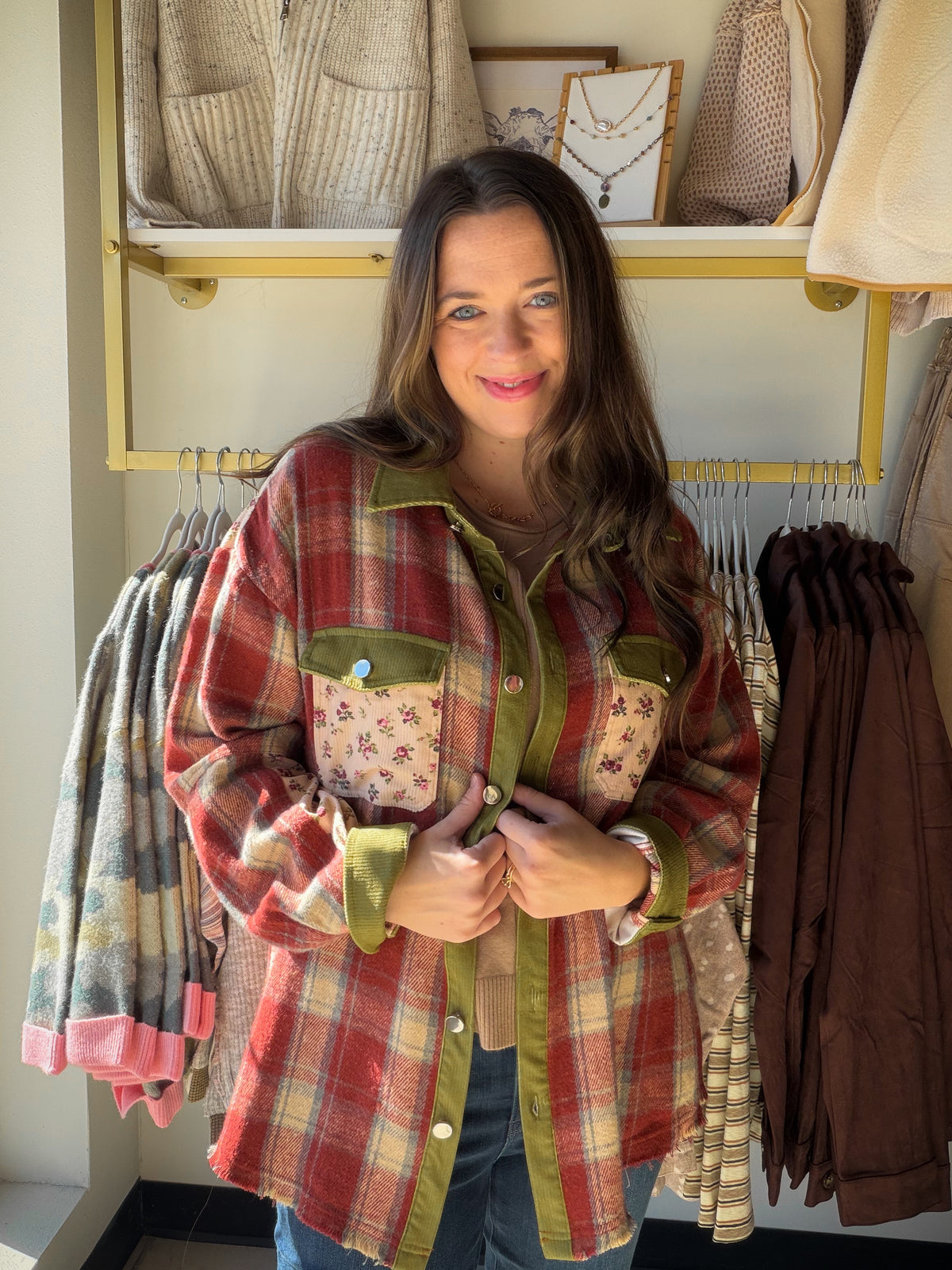 Blakeley

A cozy plaid shacket featuring mixed floral patchwork details for a unique, vintage-inspired look. Designed with a collared neckline, snap button front, dual chest pockets, and an oversized relaxed fit, this lightweight layering piece is perfect for transitioning through the seasons. Style it buttoned up or worn open over your favorite basics for an effortlessly casual look. Available in two colorways.

MATERIAL: 100% POLY&nbsp;

SIZING:

XS 0/4

S/M &nbsp;4-8

L/XL 8-14

1X 16/18
