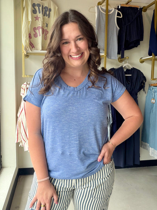 Staccato

Elevate your daily rotation with this buttery-soft Staccato tee featuring a premium denim-textured slub finish. Its flattering V-neck and breathable fabric deliver a chic, lived-in look that transitions effortlessly from lounging to lunch dates.

Buttery soft premium slub fabric.
Flattering V-neck for effortless style.
Unique denim-inspired textured finish.
Breathable short sleeves for comfort.
Versatile fit for easy layering.
Durable quality for everyday wear.
Chic, lived-in luxury aesthetic.

