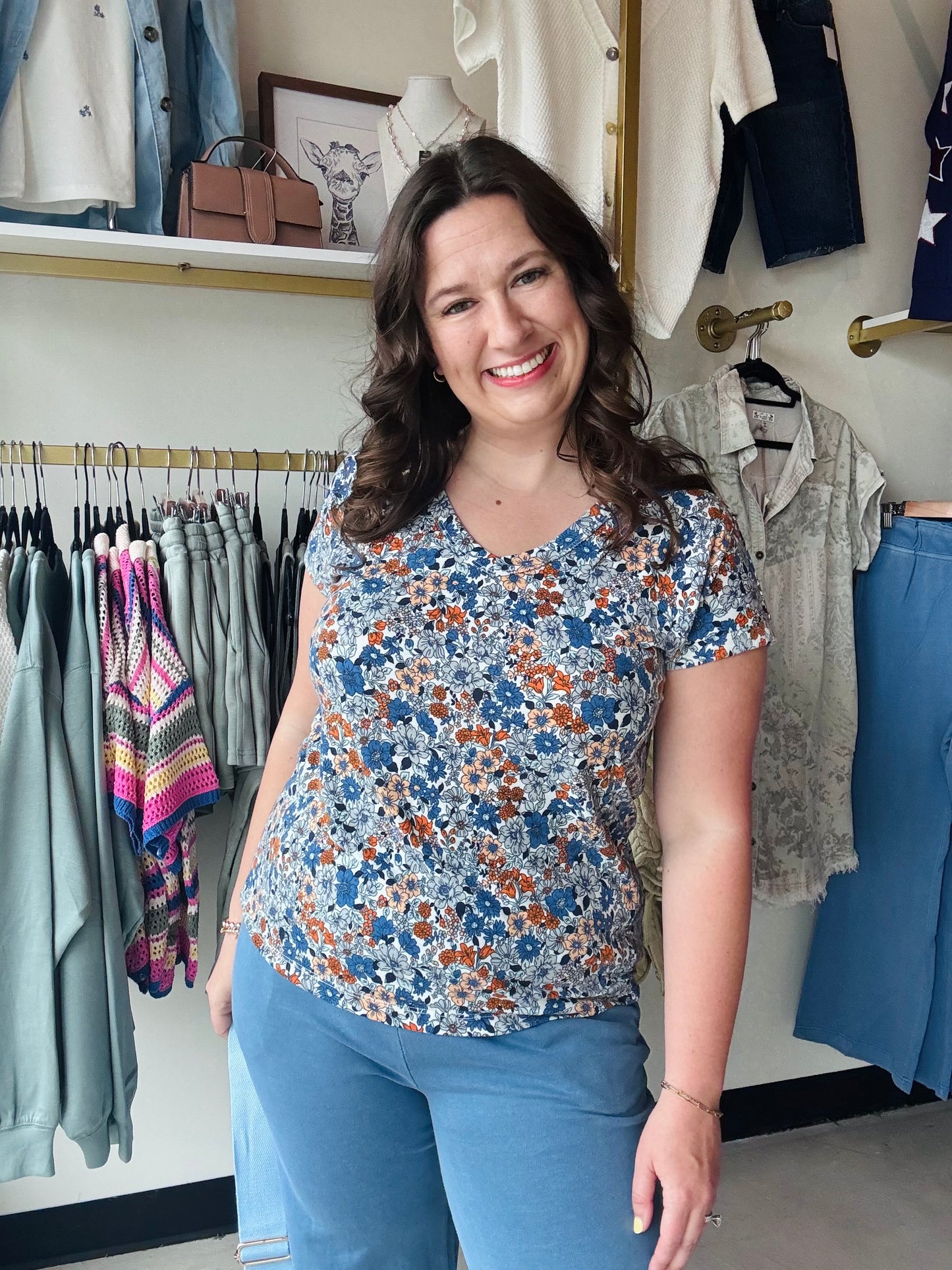 Staccato

Brighten your wardrobe with this ultra-soft jersey knit top featuring a vibrant blue and orange floral print. The flattering V-neck and breathable short sleeves offer effortless style and all-day comfort for any occasion

Ultra-soft jersey for all-day comfort
Flattering V-neckline accents any look
Vibrant blue and orange floral print
Breathable short sleeves for layering
Effortless fit for everyday wear
Premium Staccato quality and style
