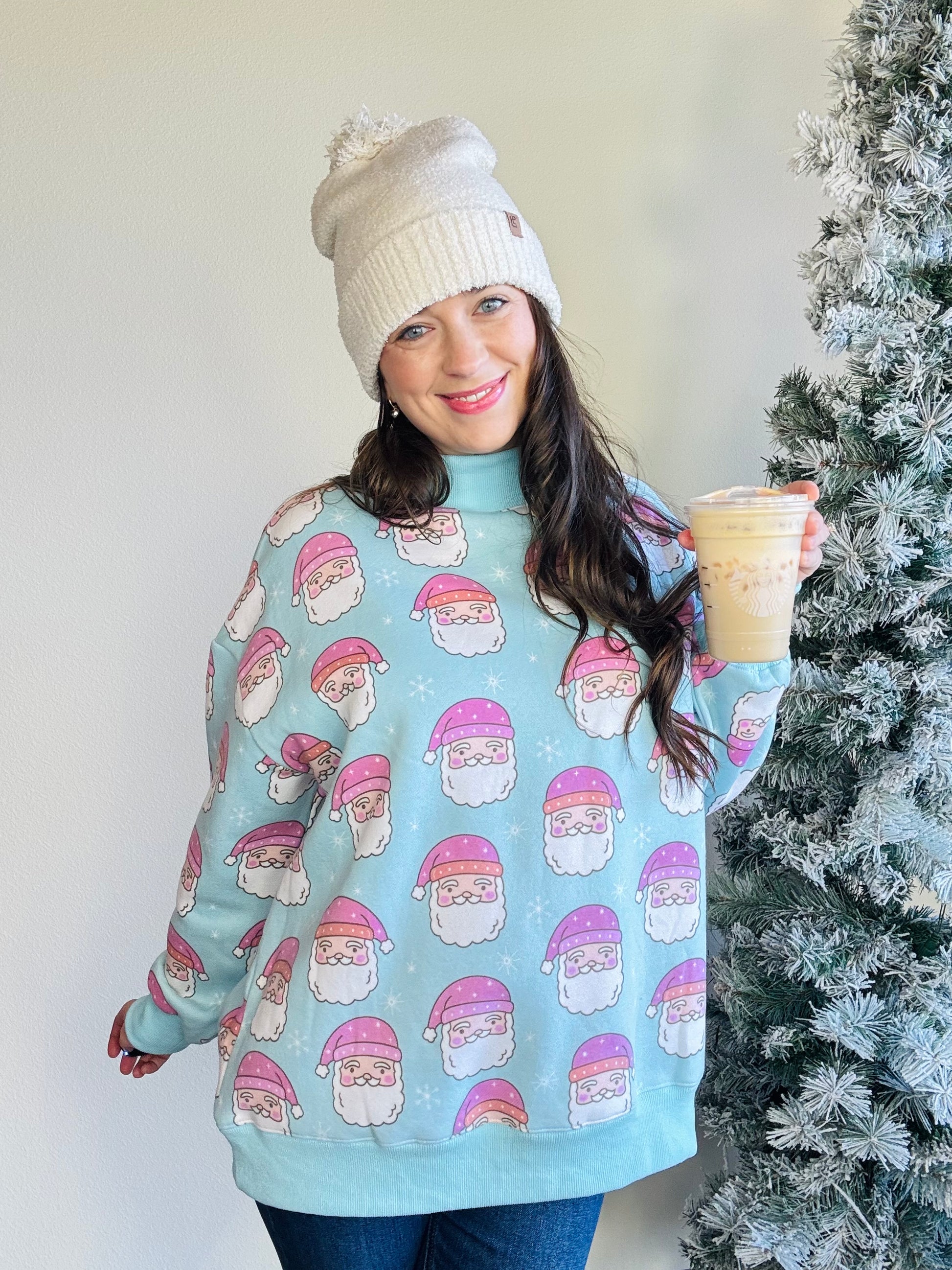 Katydid

With its oversized fit and playful vibe, it pairs perfectly with leggings, fuzzy slippers, and your fave holiday tumbler. Who says Santa only wears red? Pink is the new festive, babe!