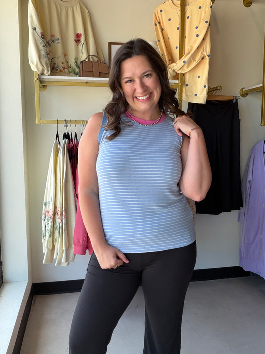 Staccato

Refresh your summer wardrobe with this chic, sky-blue striped tank featuring a vibrant pink accent collar for an unexpected pop of color. Crafted from ultra-breathable fabric, this sleeveless top offers a flattering, relaxed fit that transitions effortlessly from beach days to weekend brunch.

Vibrant pink collar adds instant style.
Timeless nautical stripes for summer vibes.
Breathable fabric ensures all-day comfort.
Flattering fit for every body type.
Soft ribbed trim for added durability.
Versa