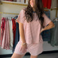 Your new favorite loungewear moment. The Striped Brick &amp; Dusty Blue Set pairs a relaxed knit top with matching mini shorts in a warm brick and dusty blue stripe that feels as good as it looks. Soft brush knit fabric, dolman sleeves, and a contrast drawstring waist make this set effortlessly comfortable — perfect for lazy mornings, errands, or lounging in style.

Matching top &amp; mini shorts set
Soft brush knit fabric with stripe pattern
Dolman short sleeves with relaxed, loose fit
Contrast color band 