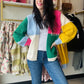 Bibi&nbsp;

Elevate your winter wardrobe with our Pink Multi Block Cardigan. This open front cardigan features a mix of pink, ivory, yellow, green, and blue, accented with stitch detailing for added style. Stay cozy and stylish with a pop of color.