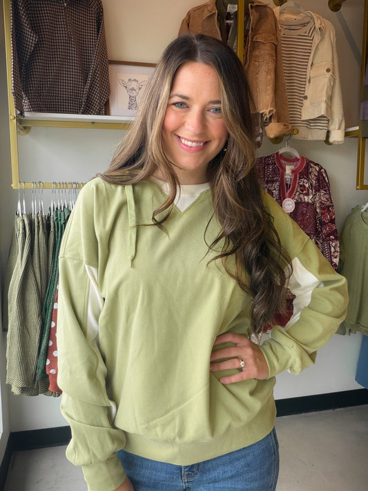 Make a statement in the most effortless way with this color-blocked hoodie from&nbsp;Staccato. The vibrant bright sage palette and micro brushed fabric make it as cozy as it is eye-catching — a weekend essential that doesn't try too hard.

Shoelace drawstring neckline for a playful, adjustable fit
Long sleeve silhouette for easy layering
Bold color block design in a fresh bright sage palette
Micro brushed fabric — soft, smooth, and comfortable all day
95% Polyester, 5% Spandex