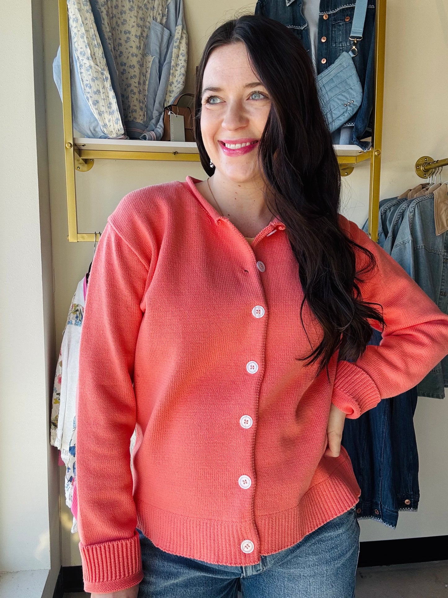 Wishlist

The Sunkist Button Up Cardigan features a modern raw edge neckline and fully functional buttons for effortless layering. This versatile piece transitions seamlessly from casual to polished, offering both style and practicality. Perfect for building a wardrobe of timeless essentials that work with everything in your closet.