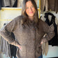 The cardigan that does it all. The Rib Accent Button Up Cardigan by Staccato is your new layering essential — a classic crew neck silhouette in warm camel with ribbed detailing that adds texture and polish. Button it up as a top, leave it open over a tee, or tuck it into trousers. Oh, and it has pockets.

Why You'll Love It

Warm brown color way— a neutral that works with everything in your closet
Rib accent detailing — adds texture and a refined, structured look
Crew neckline — classic and flattering
Full 