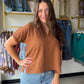 The Brown Johnny Collar Blouse by Staccato is a wardrobe staple that works harder than it looks. The distinctive Johnny collar adds a fashion-forward edge to a clean, solid silhouette — making it easy to dress up or keep casual without a second thought.

Short sleeves with an elastic finish give it a relaxed, polished fit, while the 100% Polyester fabric keeps it lightweight, wrinkle-resistant, and easy to care for. A rich brown tone makes it endlessly versatile — pair it with denim, trousers, or your 
