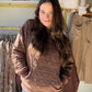 The Brown Quilted Accent Hoodie by Staccato brings a thoughtful detail to an everyday favorite. Its rich brown color and quilted accent give your casual wardrobe a fresh touch, making it an easy choice for coffee runs, weekend browsing, and laid-back afternoons.

Picture it paired with your favorite jeans and sneakers for a day out, then styled with leggings when the evening calls for a more casual look. The brown shade works beautifully with cream, denim, and other earthy tones, while the quilted accent ad