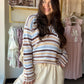 Meet your new weekend essential. The Brown Stripe Crochet Sweater Hoodie by Hem &amp; Thread brings laid-back texture and effortless style together in one cozy, oversized silhouette. With its rich brown stripe crochet detailing and relaxed hoodie design, this piece transitions seamlessly from a beach day to a casual brunch — or anywhere in between.

Details:

Crochet knit construction with brown stripe pattern
Hoodie silhouette with a slightly oversized fit
Soft, breathable fabric blend
Versatile styling — 