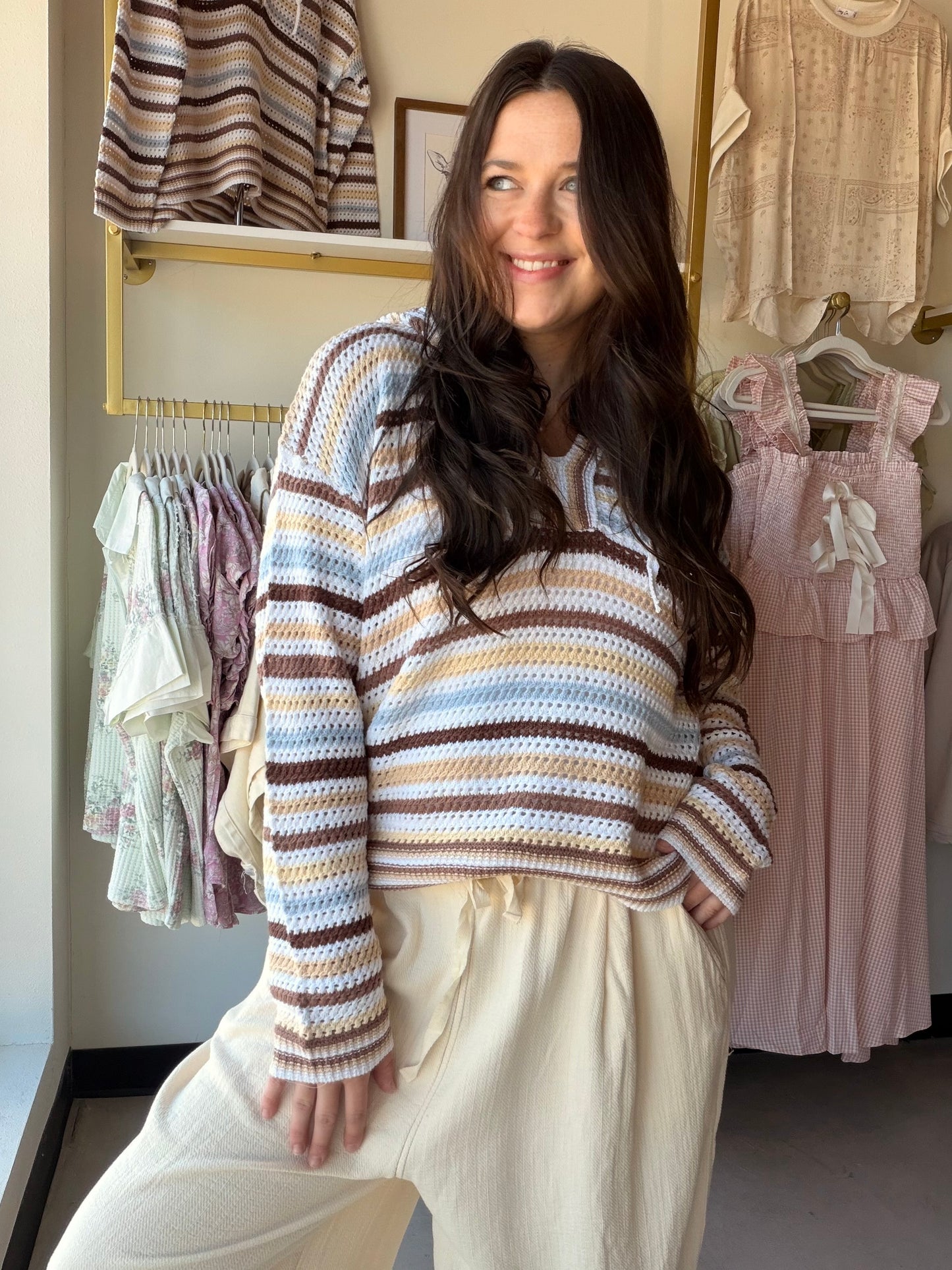 Meet your new weekend essential. The Brown Stripe Crochet Sweater Hoodie by Hem &amp; Thread brings laid-back texture and effortless style together in one cozy, oversized silhouette. With its rich brown stripe crochet detailing and relaxed hoodie design, this piece transitions seamlessly from a beach day to a casual brunch — or anywhere in between.

Details:

Crochet knit construction with brown stripe pattern
Hoodie silhouette with a slightly oversized fit
Soft, breathable fabric blend
Versatile styling — 
