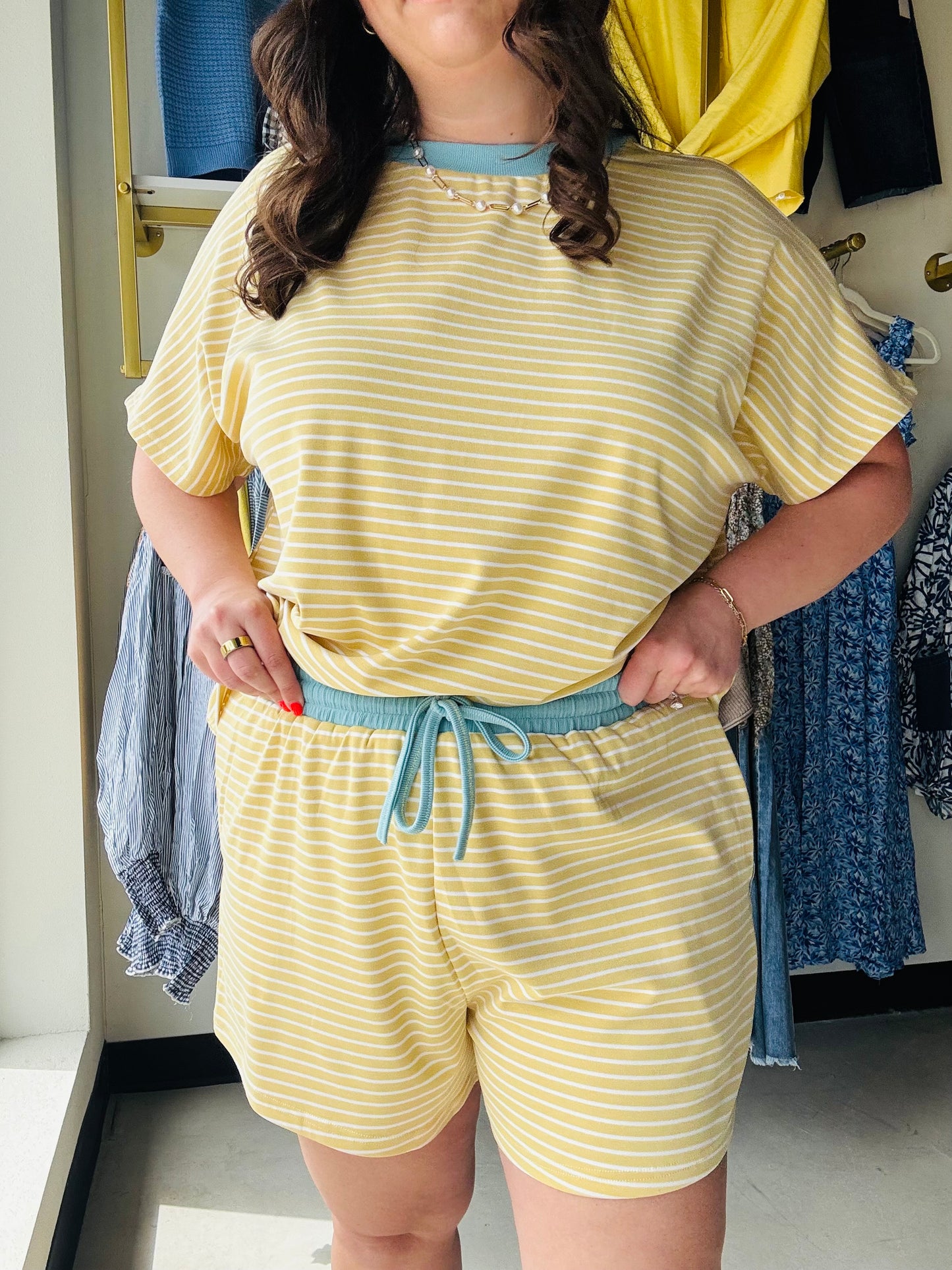 Anniewear

Brighten your downtime with these cloud-soft lounge shorts featuring a sunny yellow stripe and a contrasting sky-blue waistband. Designed for ultimate relaxation, these breezy shorts combine a functional drawstring fit with essential side pockets. Complete the look with the matching top for your new favorite weekend uniform.

Ultra-soft butter-yellow ribbed fabric.
Contrasting sky-blue elastic drawstring waist.
Functional side pockets for essentials.
Relaxed fit for all-day comfort.
Pairs perfect