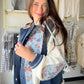 Feminine meets laid-back in the Indigo Butterfly Placket Hoodie by POL. This relaxed-fit top is crafted in a soft thermal fabric with a delicate pointed floral pattern, giving it a boho-chic charm that's anything but ordinary. Balloon sleeves add a touch of romantic volume, while the placket hoodie detail keeps things effortlessly casual.

Overlock stitch detailing lends a slightly raw, artisan edge — the kind of thoughtful detail that makes this piece feel special. Wear it as a cozy layer or let it stand o
