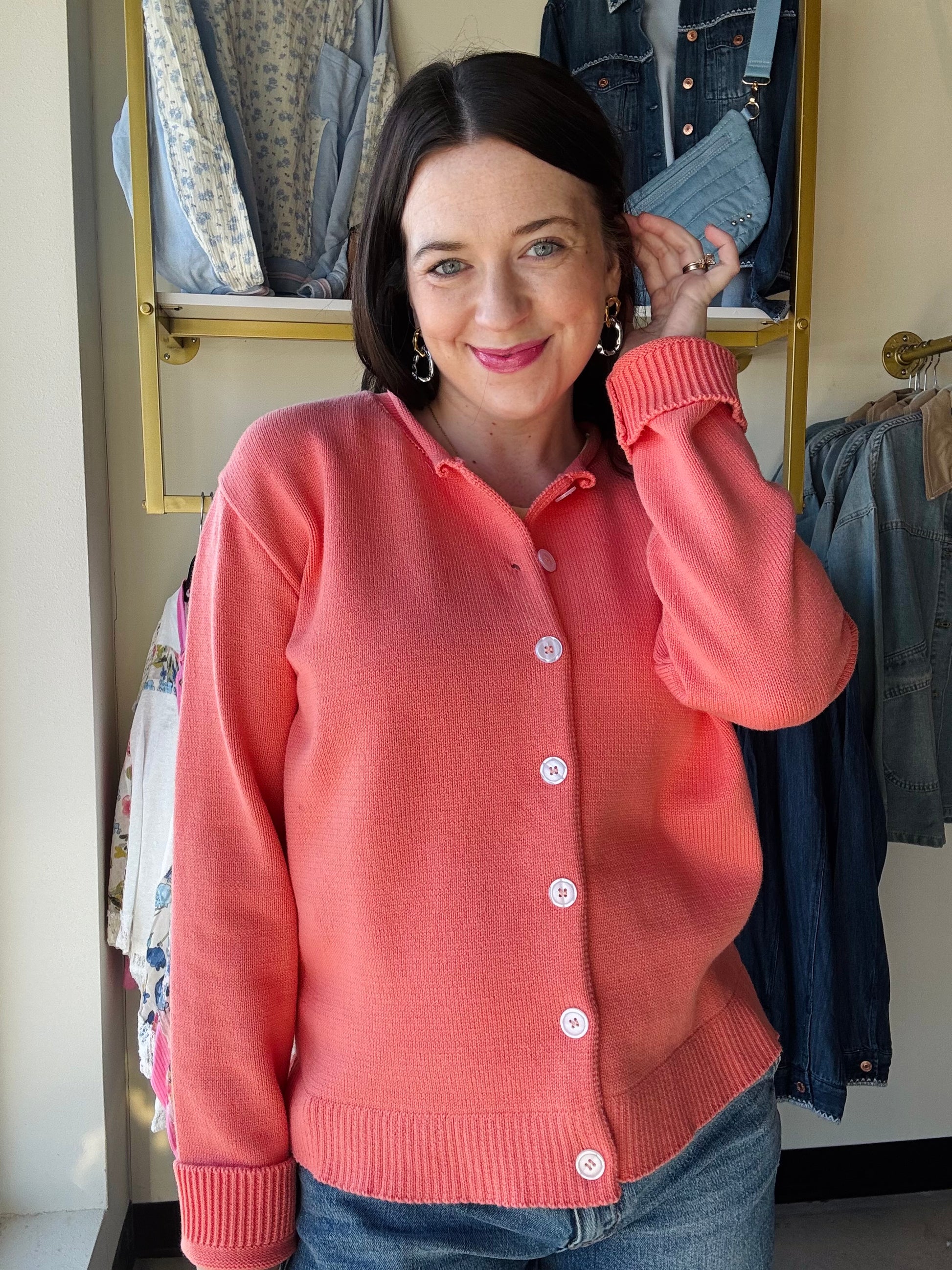 Wishlist

The Sunkist Button Up Cardigan features a modern raw edge neckline and fully functional buttons for effortless layering. This versatile piece transitions seamlessly from casual to polished, offering both style and practicality. Perfect for building a wardrobe of timeless essentials that work with everything in your closet.