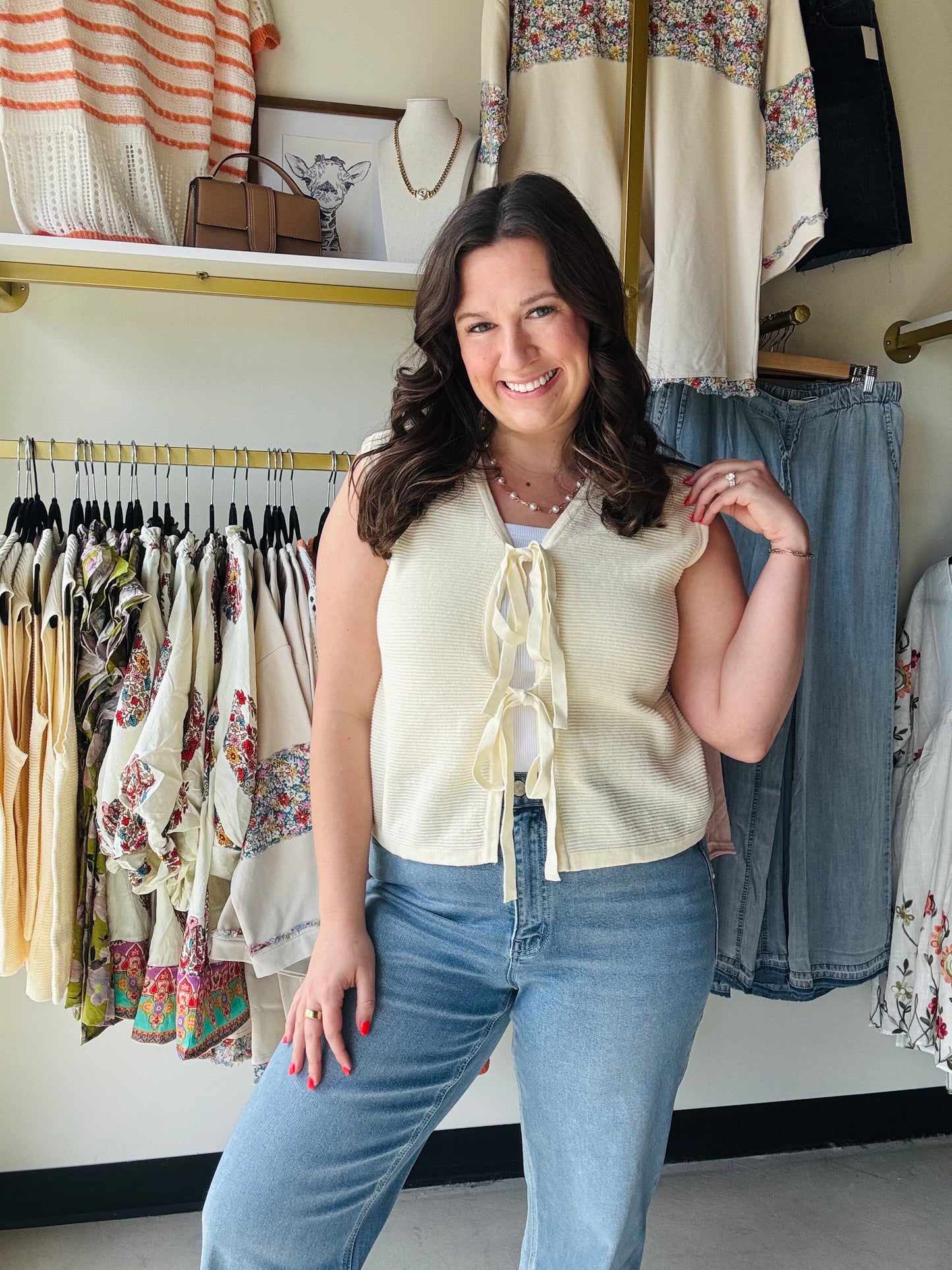 Ivory Bow Textured Sweater Vest