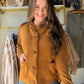 The cardigan that does it all. The&nbsp;Camel Rib Accent Button Up Cardigan by Staccato is your new layering essential — a classic crew neck silhouette in warm camel with ribbed detailing that adds texture and polish. Button it up as a top, leave it open over a tee, or tuck it into trousers. Oh, and it has pockets.

Why You'll Love It

Warm camel colorway — a neutral that works with everything in your closet
Rib accent detailing — adds texture and a refined, structured look
Crew neckline — classic and flatt