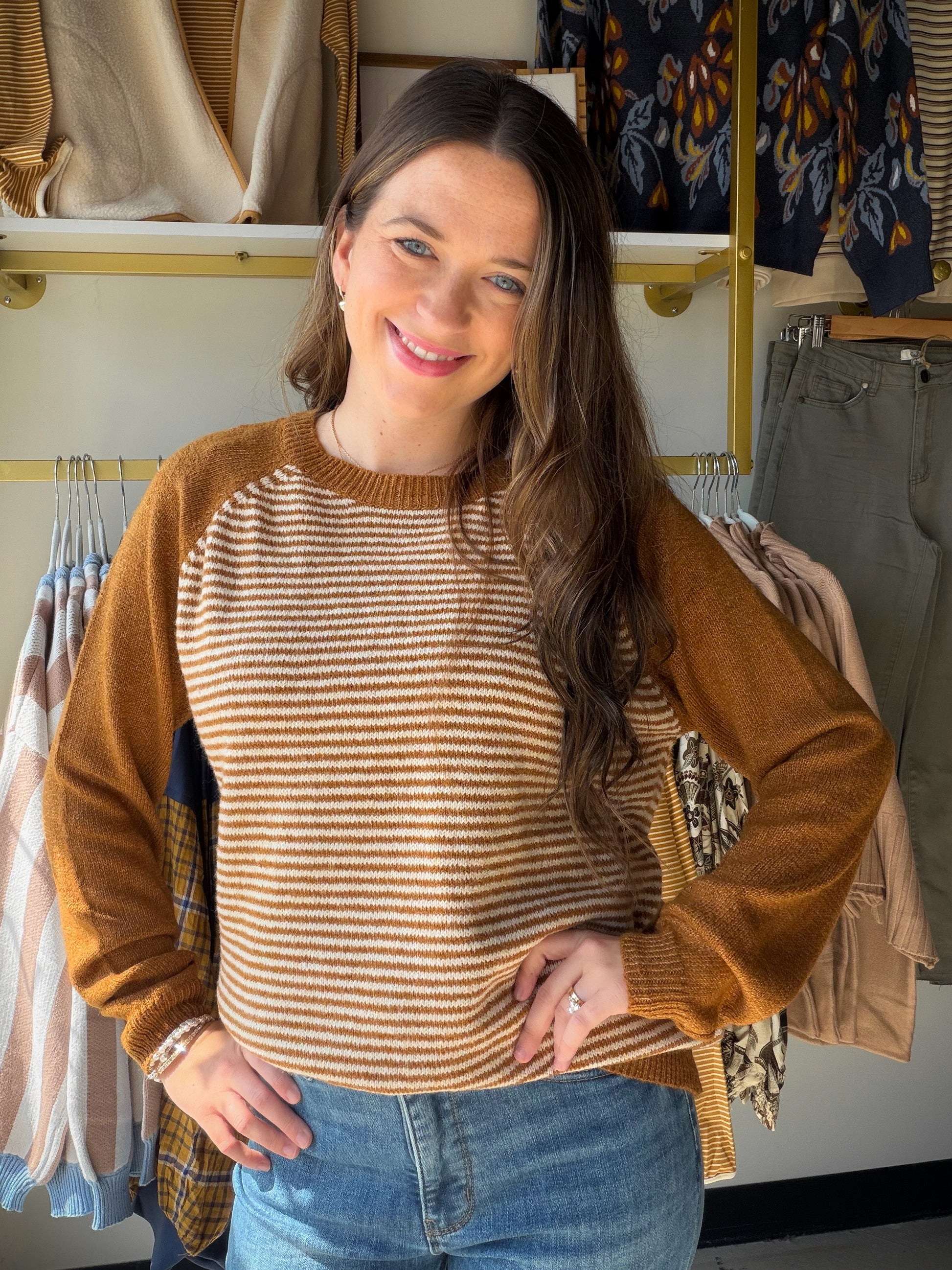 Sporty, cozy, and completely your style. The&nbsp;Camel Stripe Raglan Sleeve Sweater by Staccato brings baseball-inspired energy to your knitwear rotation — a colorblock design with classic pinstripes and raglan sleeves in warm camel that feels casual and elevated at the same time. Crew neck, long sleeves, and a relaxed fit that works with everything from joggers to your favorite denim.

Why You'll Love It

Colorblock pinstripe design — baseball-inspired with a boutique twist
Raglan sleeve construction — sp