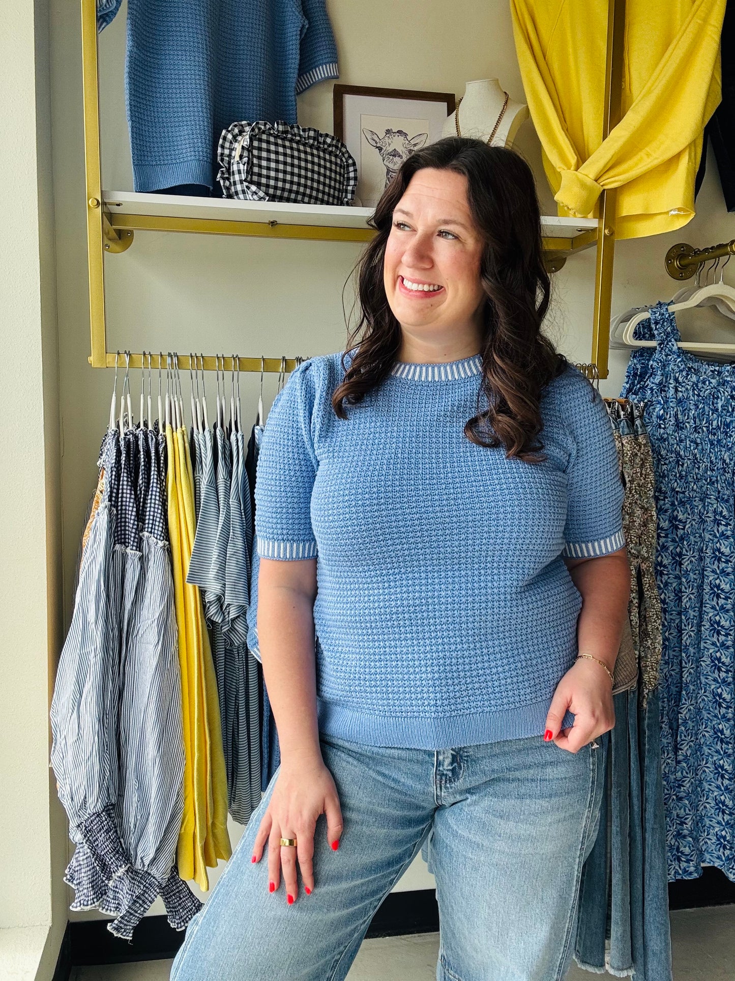 Elevate your everyday look with this breathable chambray waffle knit sweater featuring trendy balloon sleeves. Sporty striped accents and rich texture create a high-impact style that transitions perfectly from the office to the weekend.