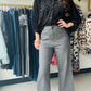 Tribal&nbsp;

Effortlessly move through your day in style with our Charcoal High Rise Capris. These versatile pants feature a flattering high-rise fit and relaxed wide legs for ease and comfort. The classic fly and marbled button add timeless charm, and the stretch ponte fabric ensures all-day comfort with a polished finish.

Fly front and DTM marble plastic button waistband closure
High rise
Wide leg
26'' inseam
Front and back patch pockets
Every Body stretch ponte fabric
