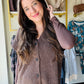 Mustard Seed&nbsp;

Get cozy and cute with this Dark Chocolate Sweater Vest! Featuring functioning buttons and playful cap sleeves, it’s perfect for layering any outfit. The ribbed detailing adds a fun texture twist while keeping things comfy and stylish. Perfect for when you want a little warmth with a lot of charm.