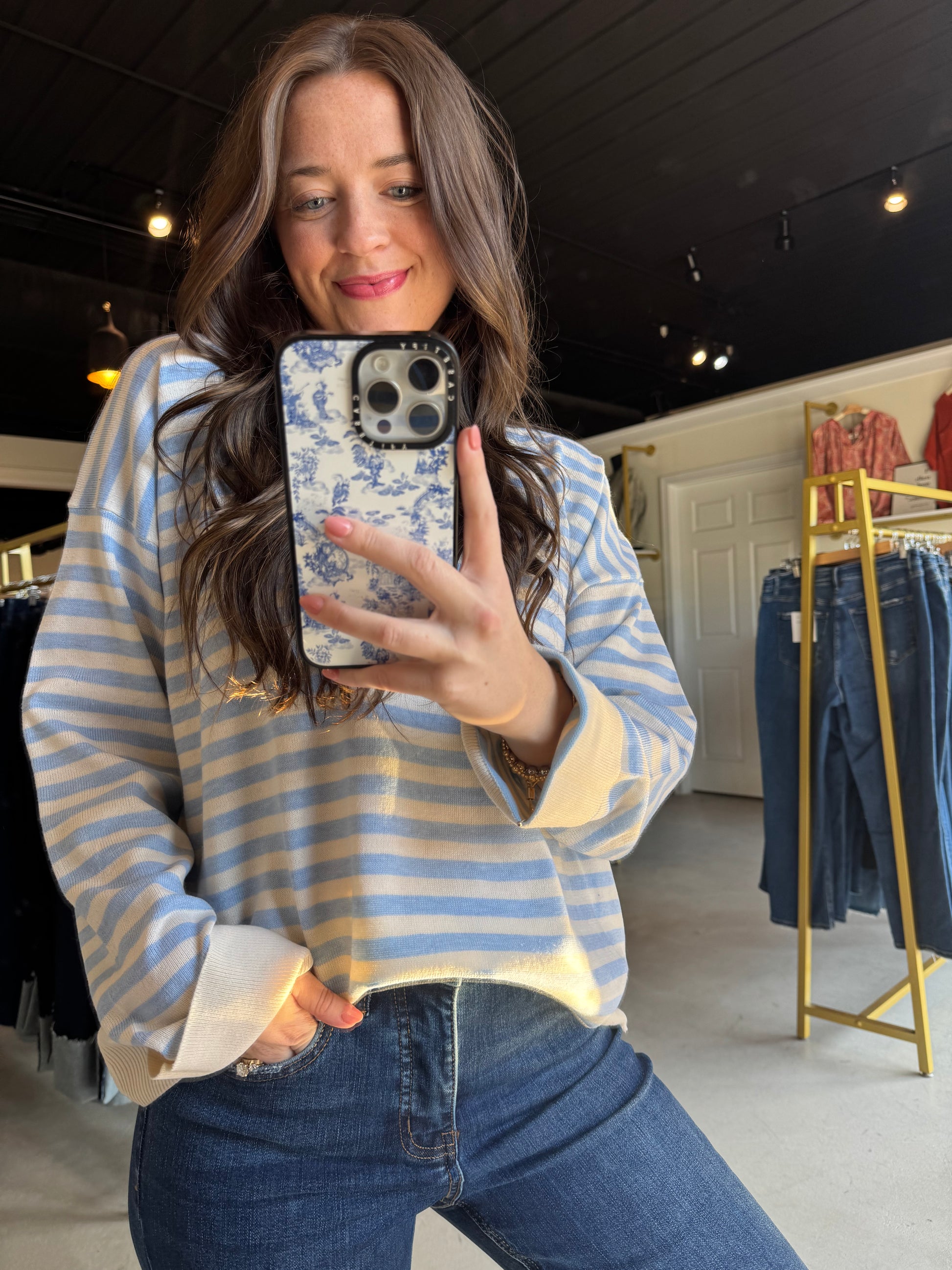 Stay cozy in the Cloud Ivory Stripe Sweater, featuring a playful crewneck and airy wide sleeves that add just the right touch of flair. Its lightweight knit keeps things breezy and comfortable, perfect for layering on cooler days. Enjoy a fun twist on a classic striped look!

Wishlist&nbsp;