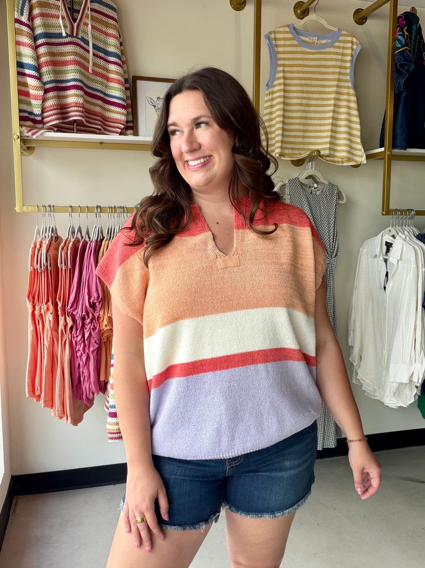 Color blocking never looked so fresh. The Coral &amp; Lilac Sleeveless Block Sweater combines two of the season's most playful hues in a relaxed, wear-anywhere silhouette that's equal parts cozy and chic.

Featuring a slit neckline and ribbed waistband for a polished finish, this sleeveless sweater is the perfect layering piece — throw it over a fitted turtleneck in cooler months or wear it solo when the temps rise. Designed with a size-inclusive range from S to 3XL.

Color block design in coral and lilac
S