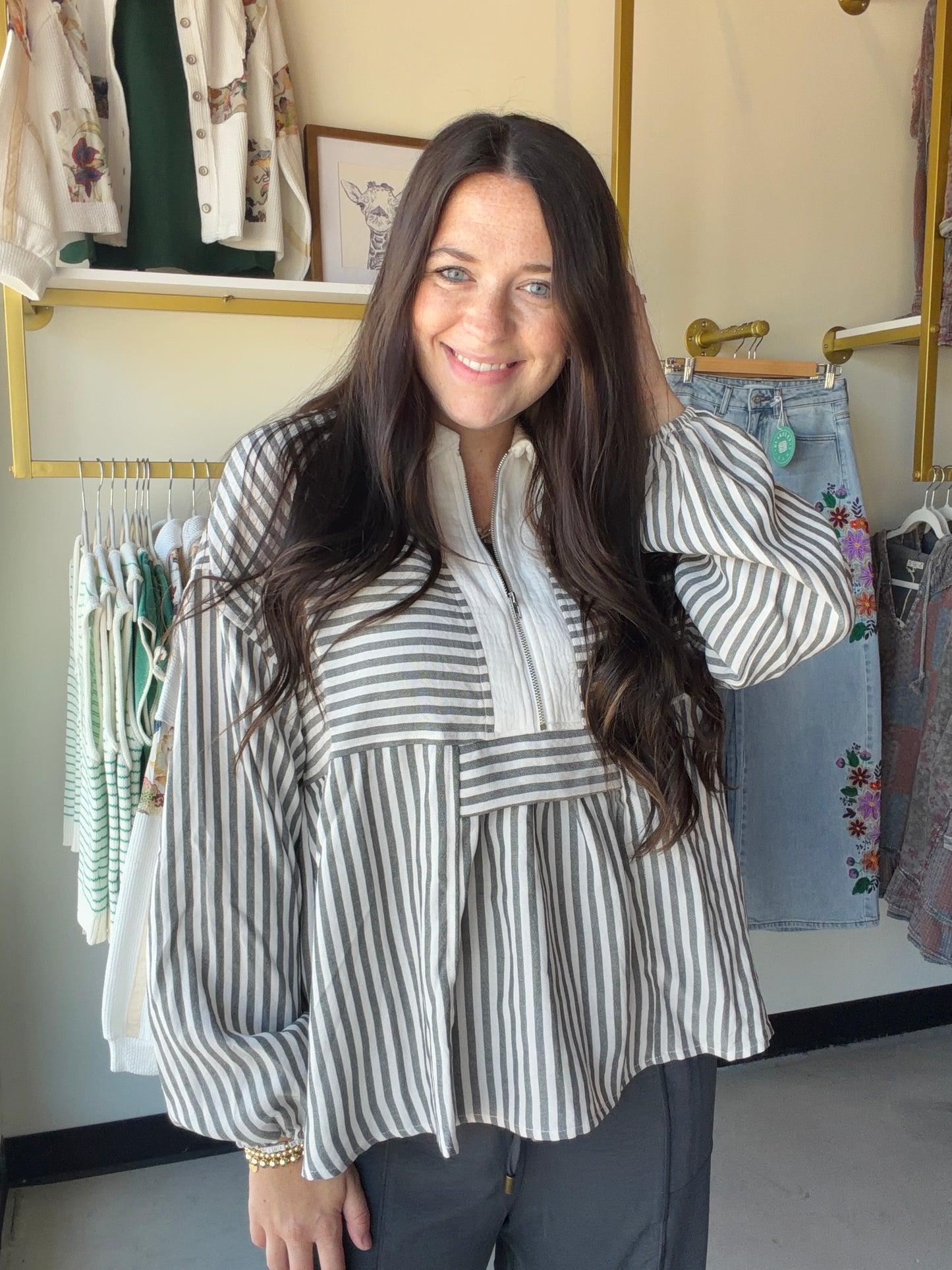 Layer up in effortless style with the Multi Stripe Charcoal Pullover. This relaxed, easy-to-wear top features a classic charcoal base with multi-stripe detailing that adds just the right amount of visual interest — perfect for throwing on with your favorite denim or joggers.

Fabric: Body: 80% Polyester, 20% Rayon | Contrast: 100% Cotton
Fit: Relaxed, true to size
Sizes: S (4–6) · M (8–10) · L (12–14)

The kind of pullover you'll reach for again and again — cozy, versatile, and effortlessly put-together.