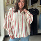 Sunday Edition

Elevate your everyday style with this 100% cotton double gauze button-down featuring chic red stripes and a relaxed dolman fit. This breathable, airy essential delivers a sophisticated coastal vibe with an effortless, lived-in feel perfect for any season.

100% breathable premium double gauze cotton.
Relaxed dolman sleeves for effortless style.
Classic button-down with chic red stripes.
Lightweight fabric for all-day comfort.
Versatile fit for work or weekend.
Soft, textured feel for premium