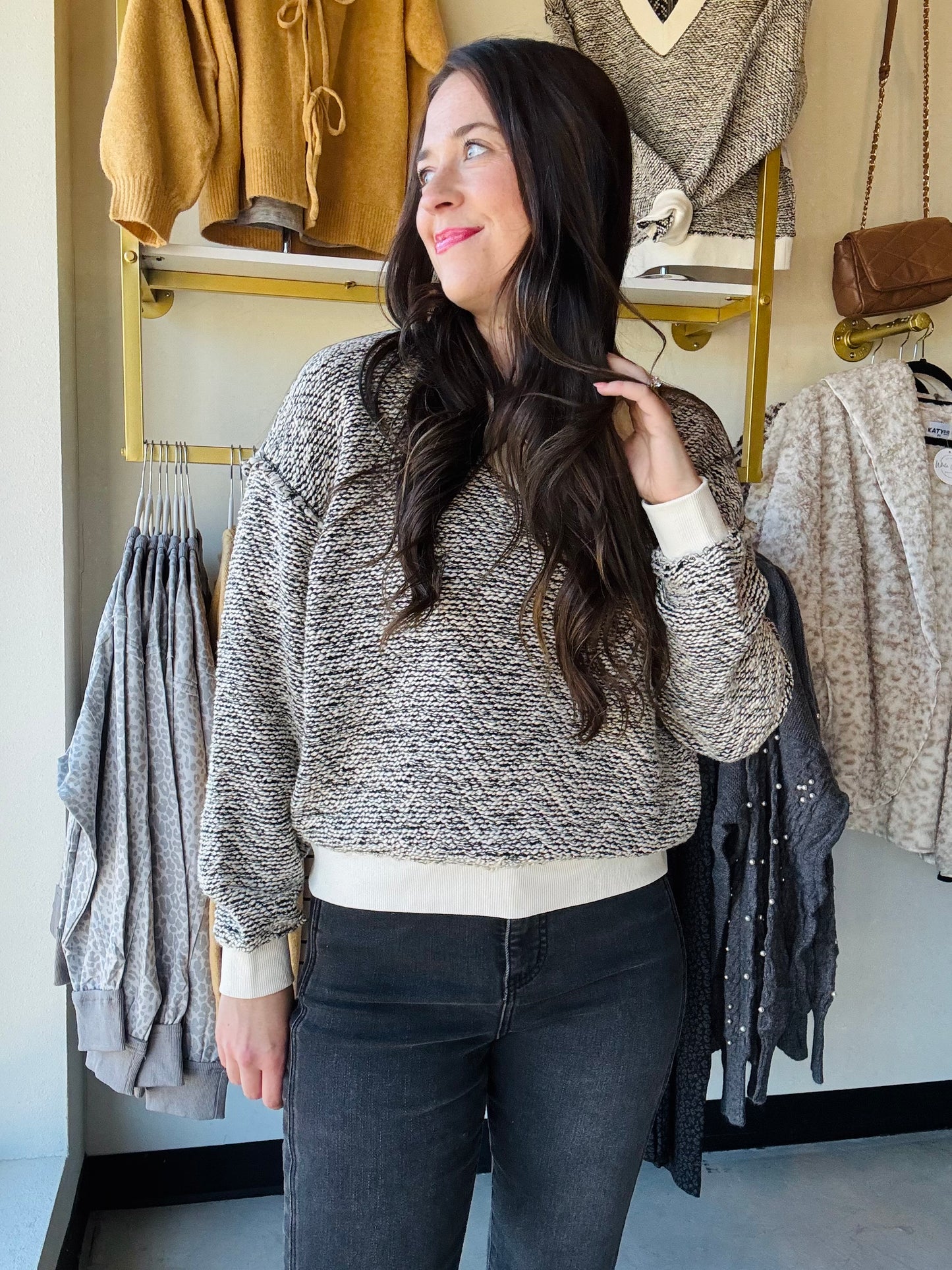 Tribal

Cozy up in this Cream Textured Knit Sweater featuring a chic V-neckline and playful drop shoulders for an effortlessly stylish look. The long sleeves and ribbed details at the cuffs, hem, and neckline add a snug touch, while the two-tone textured knit brings fun depth and warmth to your outfit. Perfect for layering or wearing solo on breezy days!