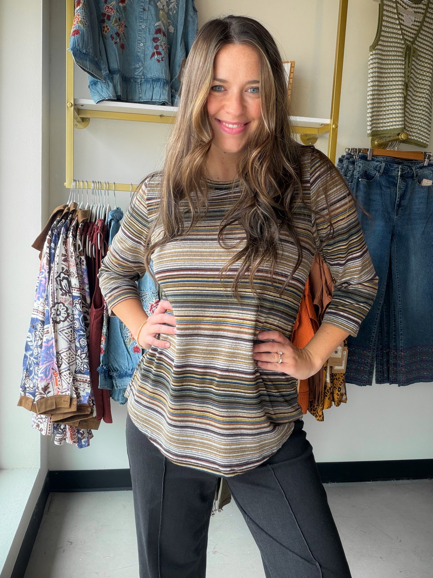 Meet your new go-to top. The&nbsp;Multi Stripe 3/4 Sleeve Top blends a playful stripe pattern with a flattering 3/4 sleeve silhouette — the kind of piece you reach for again and again.

Crafted from a 95% Polyester, 5% Spandex blend, it moves with you throughout the day while holding its shape beautifully. Whether you're dressing it up with your favorite denim or keeping it casual, this top transitions effortlessly from morning errands to evening plans.

3/4 sleeve length for a polished, versatile look
Stre