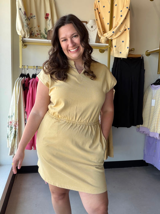 Elevate your casual wardrobe with the Dandelion Mineral Wash Mini Dress, crafted from ultra-soft, breathable cotton. Featuring a figure-flattering cinched waist and essential side pockets, this sleeveless staple delivers effortless style and all-day comfort.

Ultra-soft mineral washed cotton fabric.
Flattering cinched waist defines silhouette.
Functional side pockets for essentials.
Breathable fabric for all-day comfort.
Modern notched neck and dropped shoulders.
Versatile mini length for effortless styling