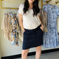The Sharon Navy Dots Skort combines style and practicality with built-in shorts for worry-free movement. This casual, comfortable piece features a charming navy dot pattern that pairs effortlessly with white for endless summer outfit combinations. Perfect for warm-weather days when you want to look put-together without sacrificing comfort or modesty.