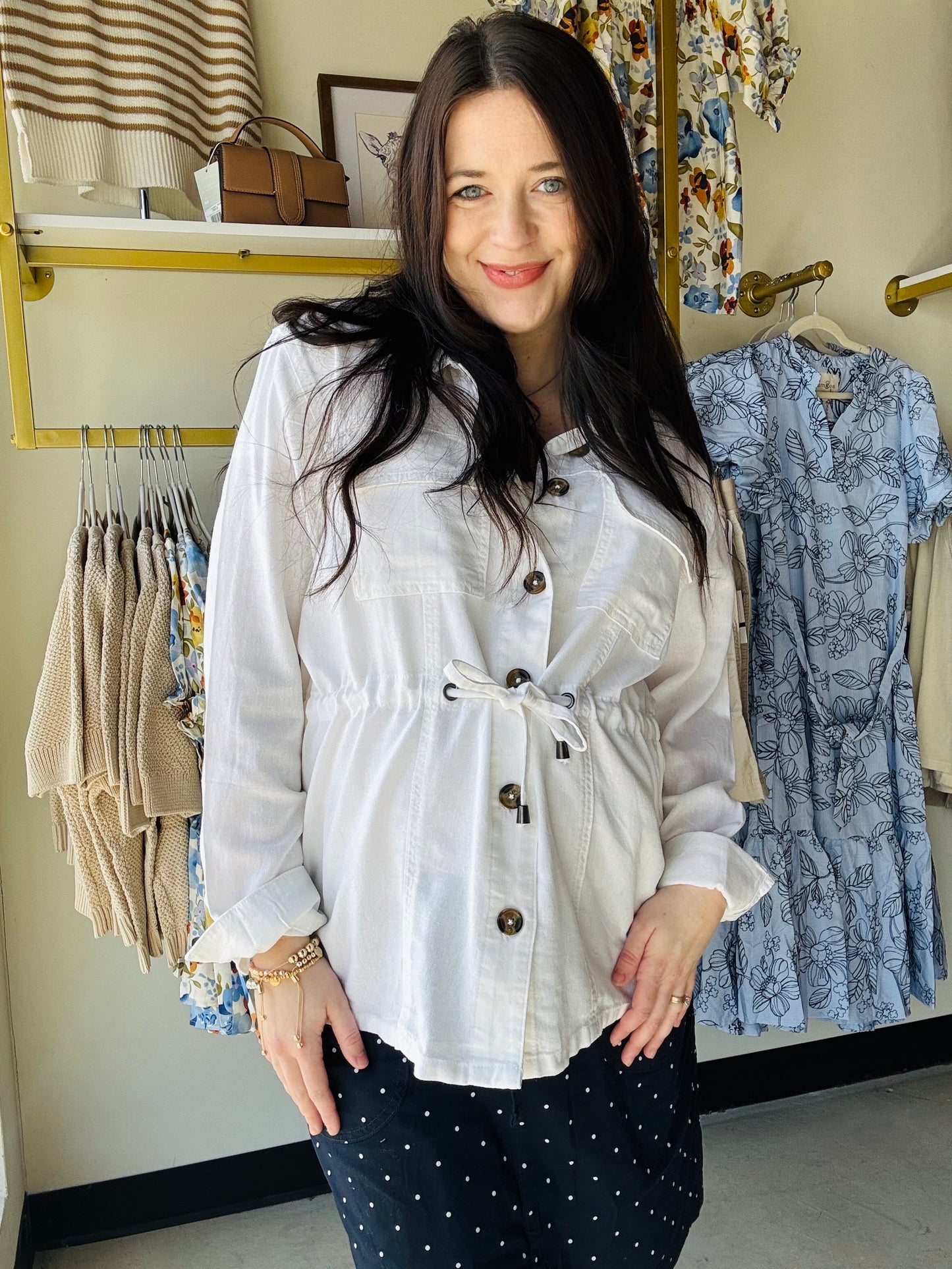 Effortless layering meets timeless style with this linen tie waist jacket. Featuring cuffed sleeves, warm brown buttons, and a flattering tie waist design, it transitions seamlessly from open draping to buttoned sophistication. Perfect for adding dimension to any outfit while keeping you cool and comfortable in natural linen fabric.