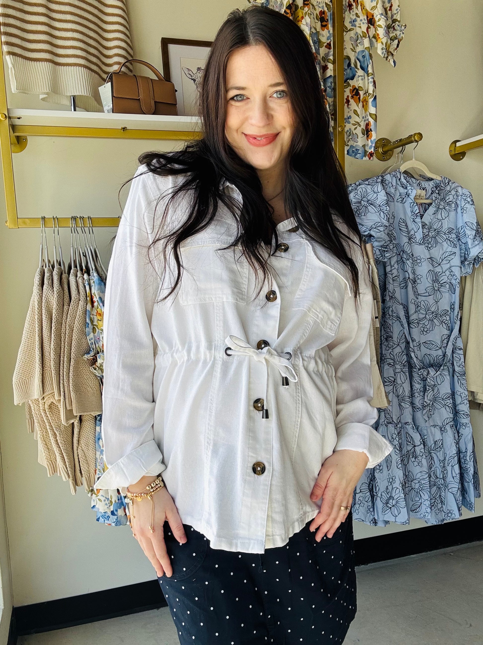 Effortless layering meets timeless style with this linen tie waist jacket. Featuring cuffed sleeves, warm brown buttons, and a flattering tie waist design, it transitions seamlessly from open draping to buttoned sophistication. Perfect for adding dimension to any outfit while keeping you cool and comfortable in natural linen fabric.
