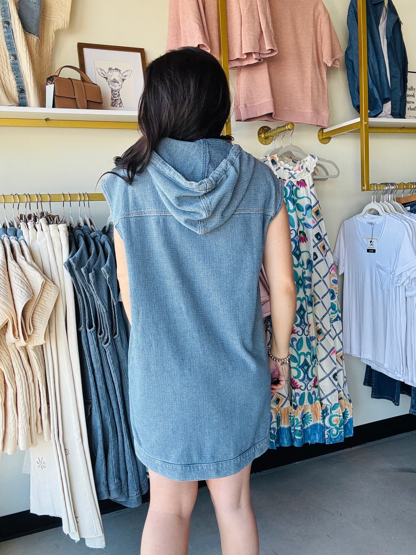 Wishlist

Effortless style meets comfort in this cotton denim hoodie dress. Featuring a relaxed fit with a convenient zip closure, it's perfect for layering or wearing solo. The soft cotton construction keeps you comfortable all day, while the denim fabric adds durability and timeless appeal. Ideal for casual outings, weekend wear, or cozy days at home. A versatile wardrobe essential that transitions seamlessly from season to season.
