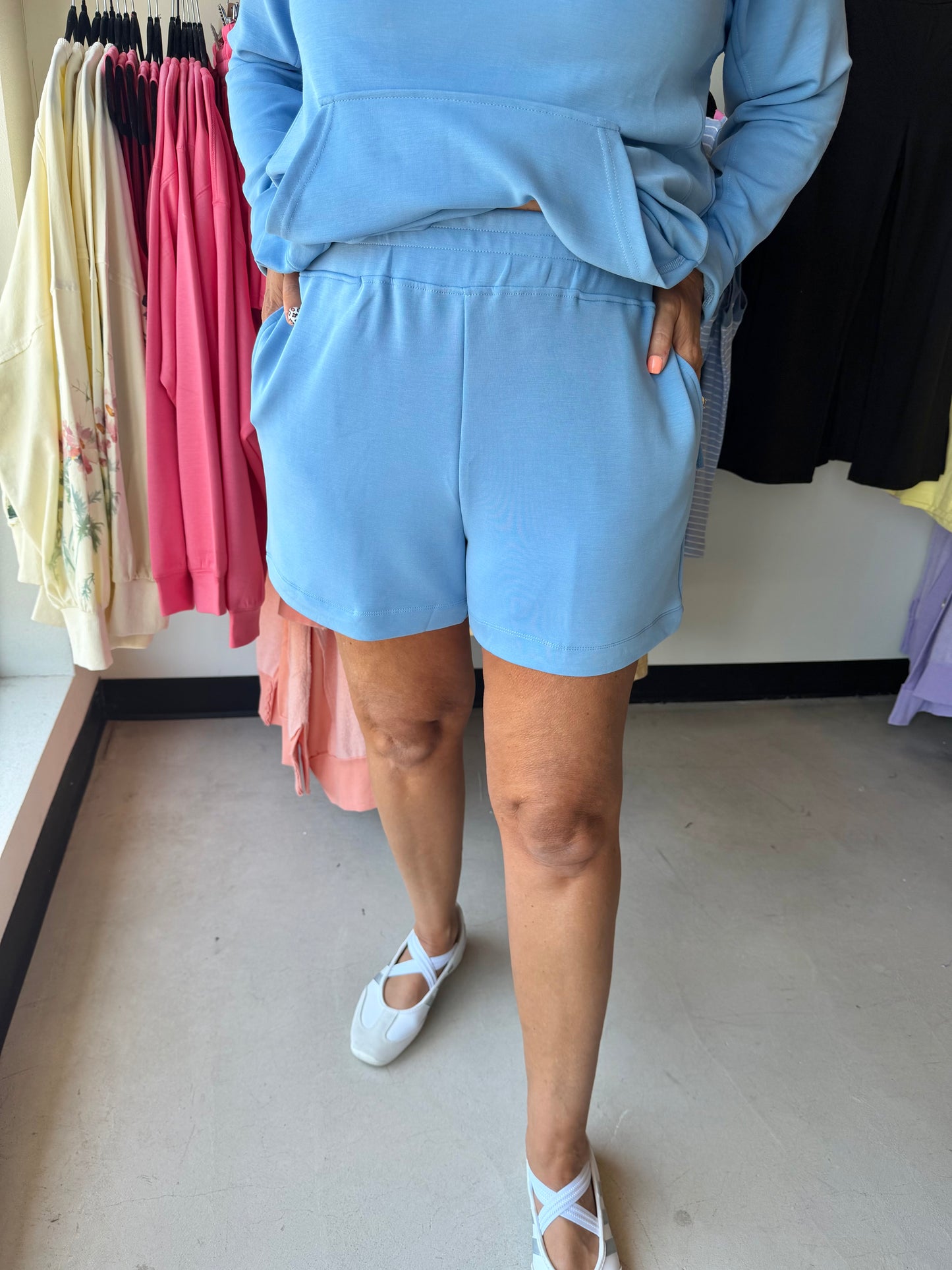 Discover the ultimate in comfort and style with our Scuba Simple Lounge Shorts. Featuring an elastic encased waistband for a custom fit, these shorts are designed to offer a loose and relaxed feel perfect for lounging. The addition of side pockets adds functionality without sacrificing style. Made from premium scuba fabric, these shorts are both cozy and chic, making them a versatile addition to your wardrobe