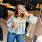 POL

Embrace effortless romance with this square-neck denim blouse featuring delicate lace panels and vintage-inspired floral embroidery. The lightweight, tiered ruffle silhouette offers a breezy, relaxed fit designed for everyday elegance and feminine movement.

Soft, romantic boho-chic aesthetic.
Intricate lace and floral embroidery.
Breathable, lightweight textured woven fabric.
Flattering, flowy tiered babydoll silhouette.
Unique raw-edge vintage detailing.
Effortless styling for any occasion.
