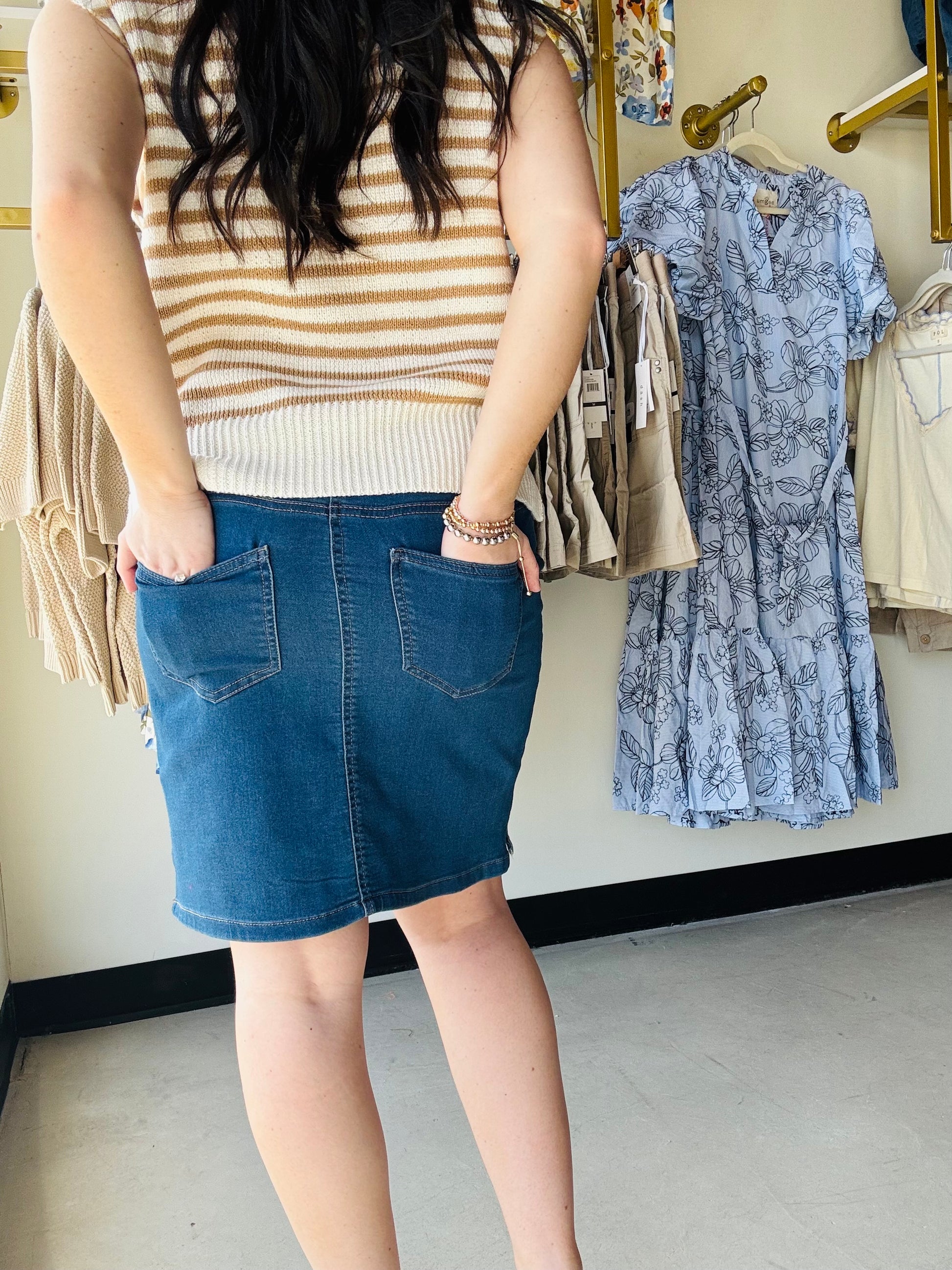 Introducing the Athena Denim Wash Skort—where versatility meets everyday style. This hybrid piece seamlessly transitions from casual outings to active adventures, combining the comfort of shorts with the polished silhouette of a skirt. Crafted from quality denim with a modern wash, it's designed to become a go-to staple in your wardrobe. Whether you're running errands, meeting friends, or exploring the outdoors, the Athena delivers effortless style and practical comfort. Elevate your closet with this must-h